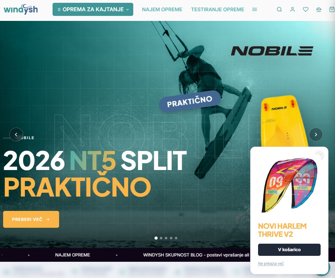 Domača stran Windysh s pasico, v spodnjem desnem kotu kartica pojavnega okna s sliko kajta, napisom Novi Harlem Thrive V2, gumbom in povezavo Ne prikazuj več